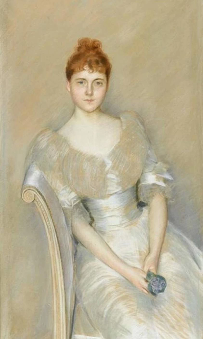 Ritratto di giovane donna in bianco con fiori